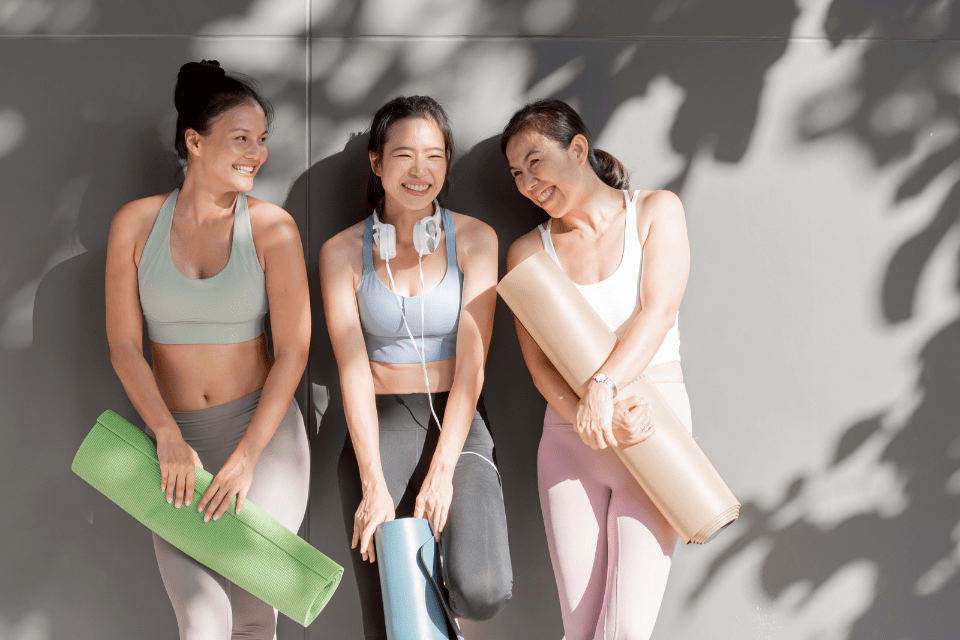 Filipina Women Laughing Together After Yoga Class