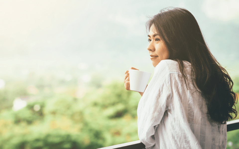 Filipino Woman Drinking Coffee in the Morning