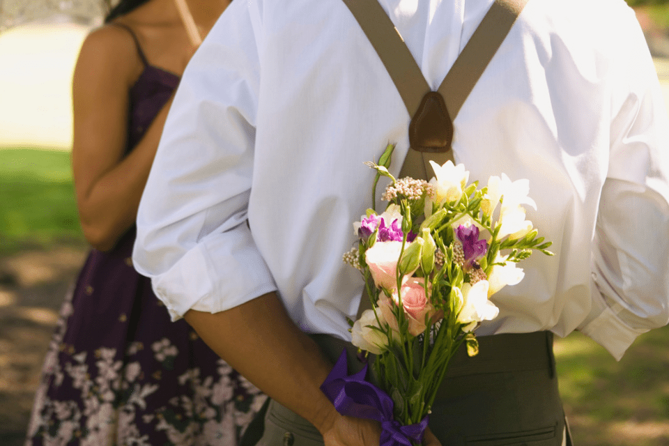 Man with Bouquet of Flowers