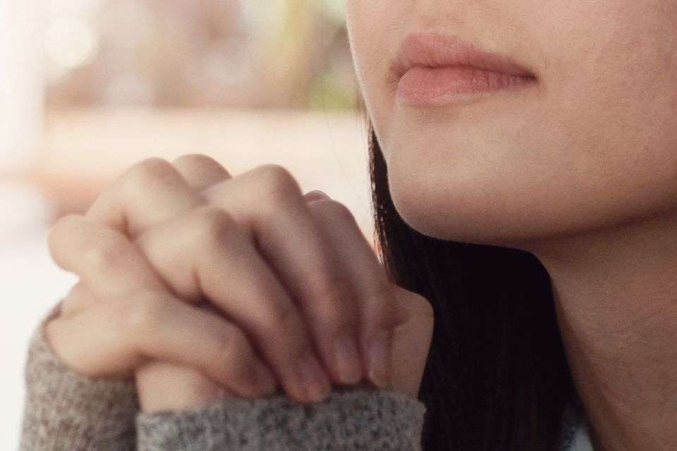 Young Filipino Woman Praying