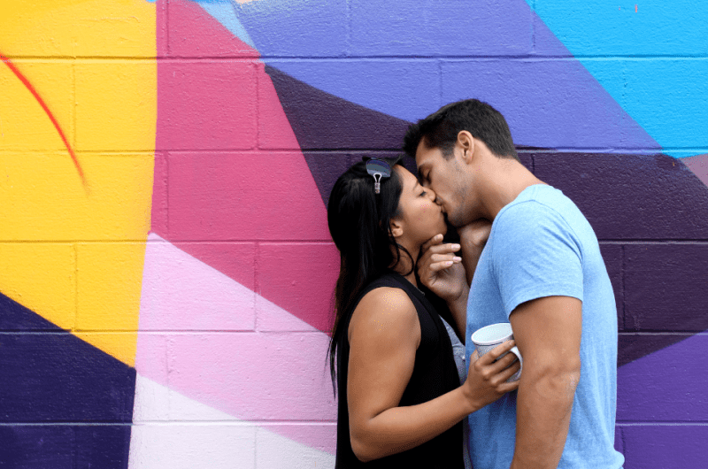 A Couple in Love Kissing - Simple Guide to Choosing the Right Filipino Dating Online Platform - Blossoms Dating Blog