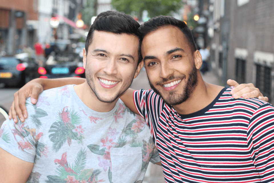 Gay Interracial Couple Having Fun Outdoors During Fiesta in the Philippines