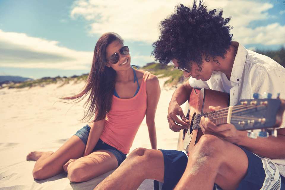 Serenading a Filipina Girlfriend by the Beach - Filipino Dating Culture: Insights into Dating Practices in the Philippines