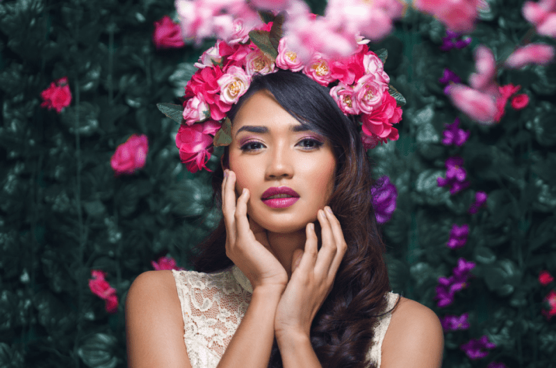Beautiful Filipino Woman Posing Amidst Roses