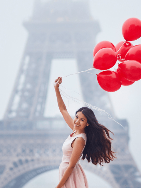 Filipina Single With Balloons in Front of the Eiffel Tower