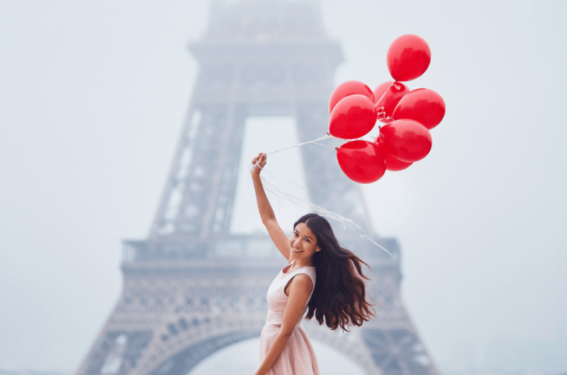 Filipina Single With Balloons in Front of the Eiffel Tower