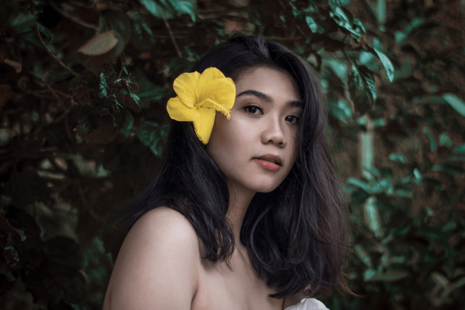 Asian Woman With Flowers in Her Hair