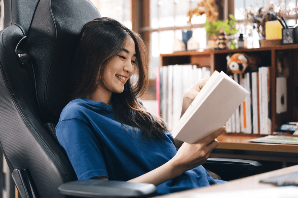 Filipina Reading a Book